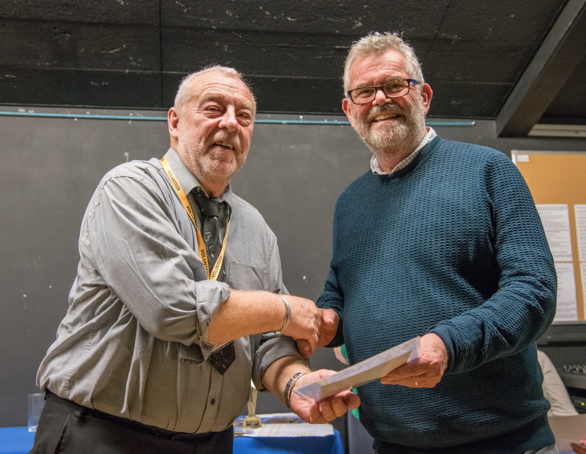 Paul Rutherford presents Chris Brammall with his prize